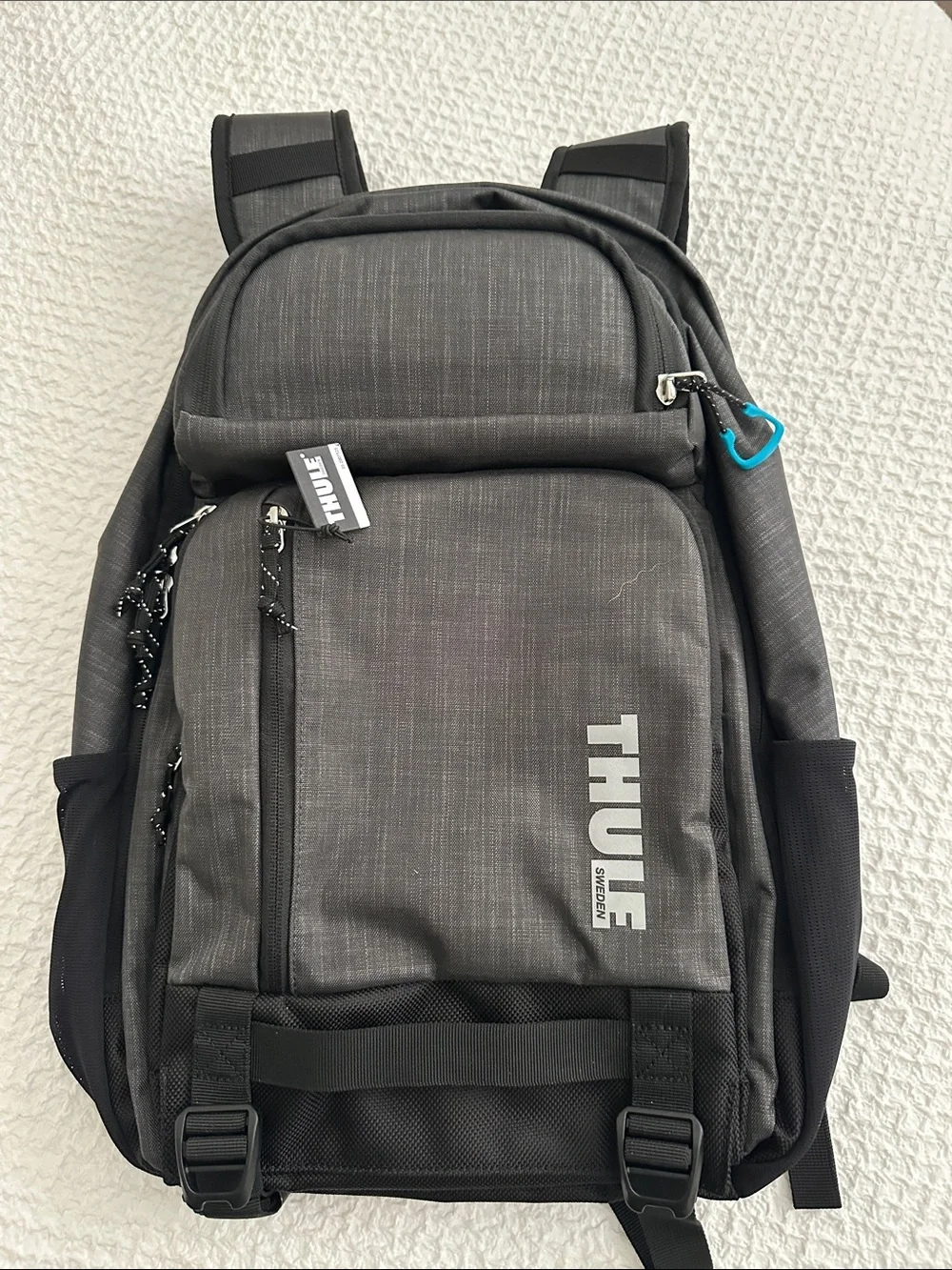 Thule Charcoal Gray Backpack with Teal Accent